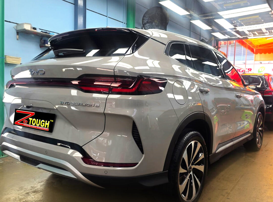 Rear quarter of the BYD Sealion, glossy and protected.