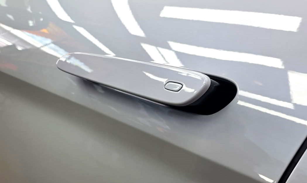 Rear quarter of the BYD Sealion, glossy and protected.