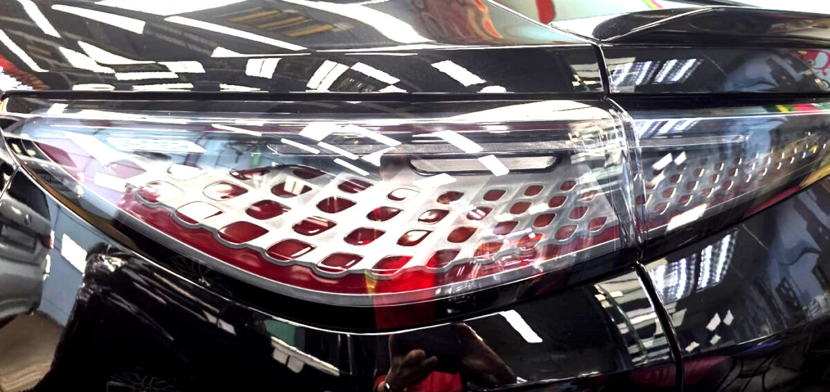 Rear quarter of the BYD Sealion 7, glossy and protected.