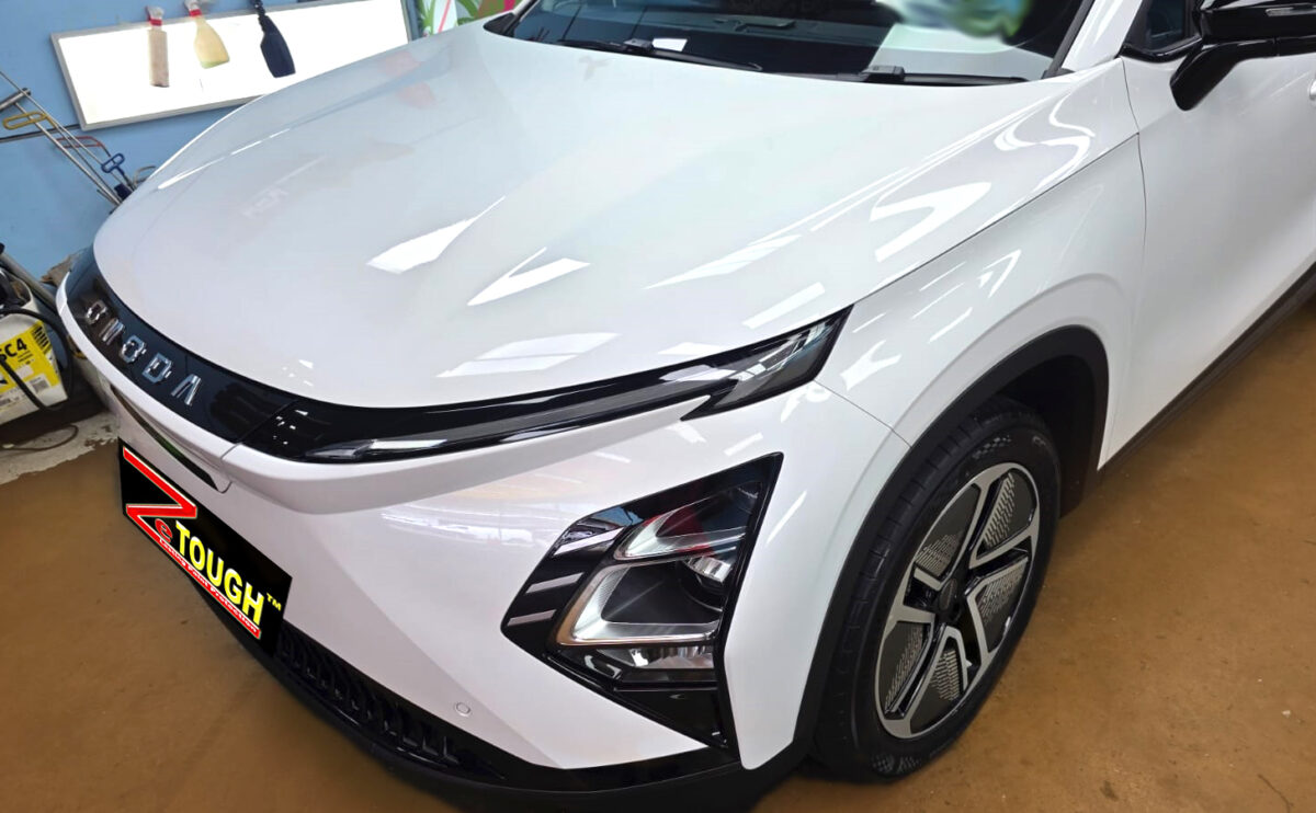 The Chery Omoda E5's coated paintwork under workshop lighting.