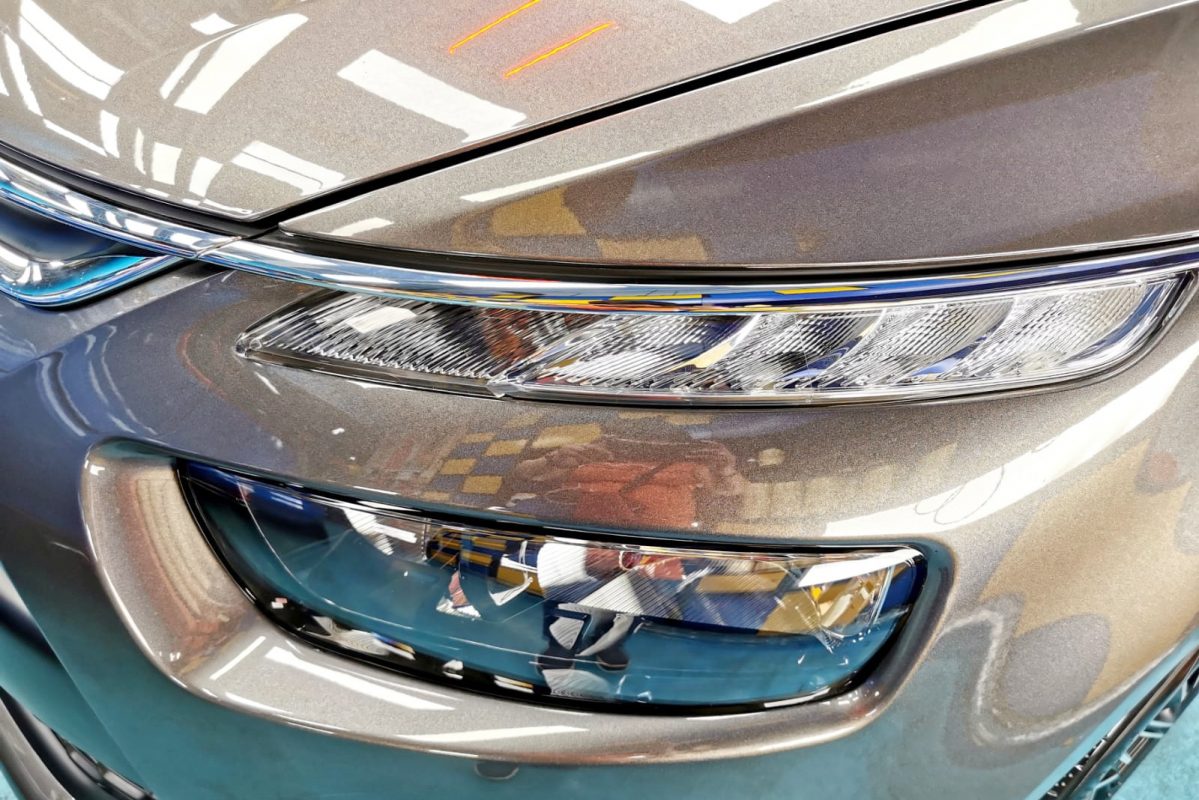 The C4 Picasso's coated paintwork showing clean reflections.