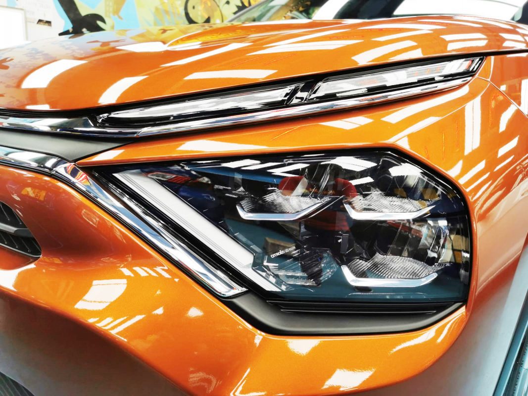 The C4's coated paintwork showing clean reflections.