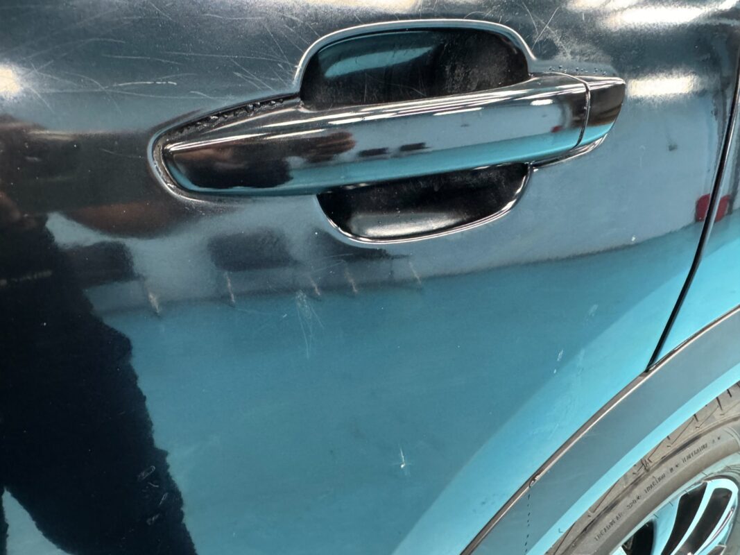 The Citroen C5 Aircross from another angle at intake, showing the damaged paintwork.