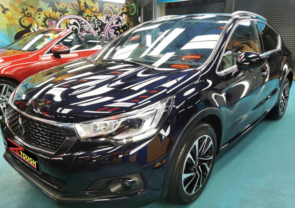 The DS4's coated paintwork showing clean reflections.