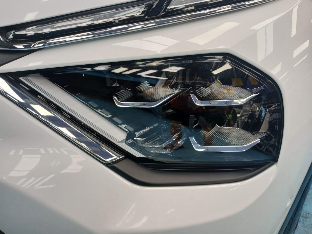 The E-C4's coated paintwork showing clean reflections.