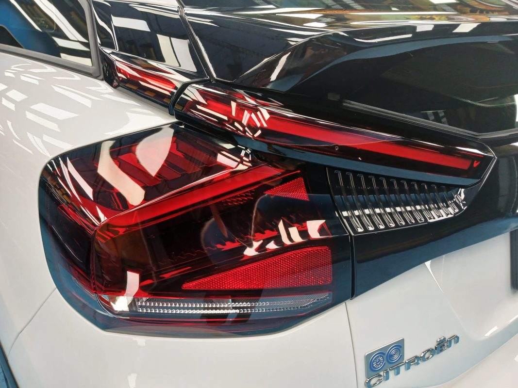 Rear quarter of the Citroen E-C4, glossy and protected.