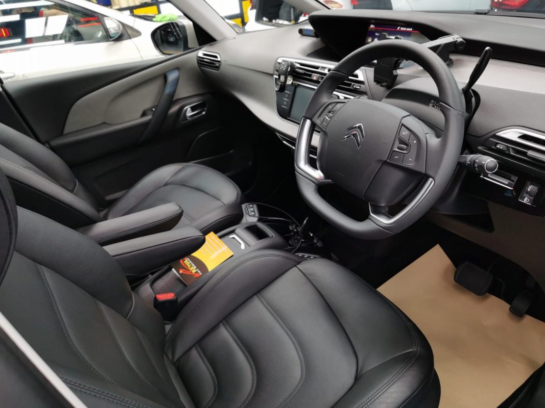 The Citroen Grand C4 Space Tourer parked in the workshop, freshly coated.