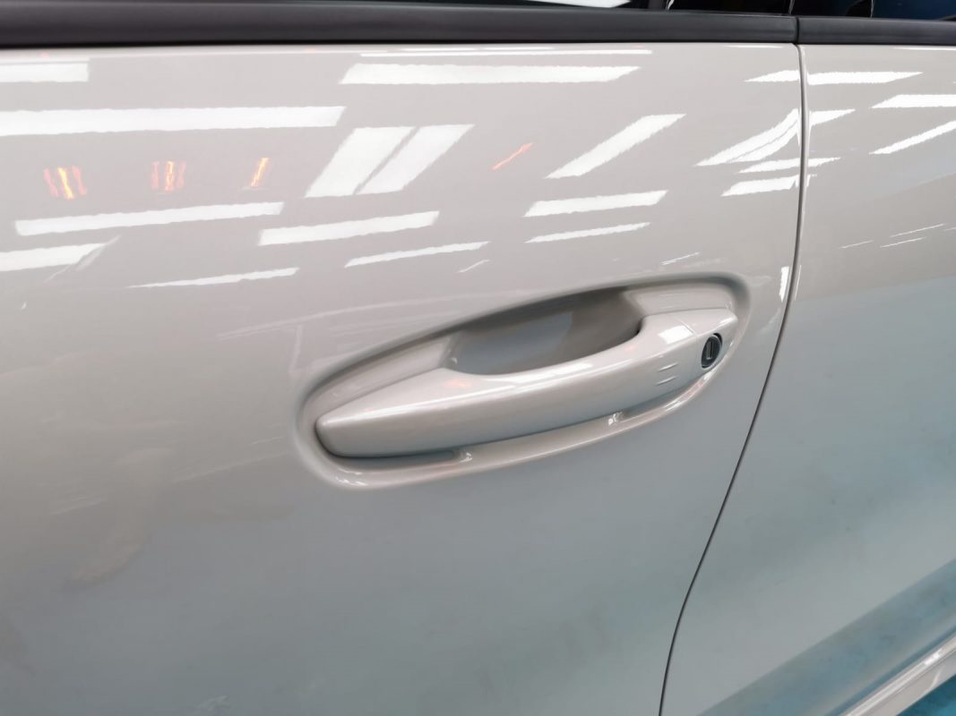 Front three-quarter view of the Citroen Grand C4 Space Tourer after coating.