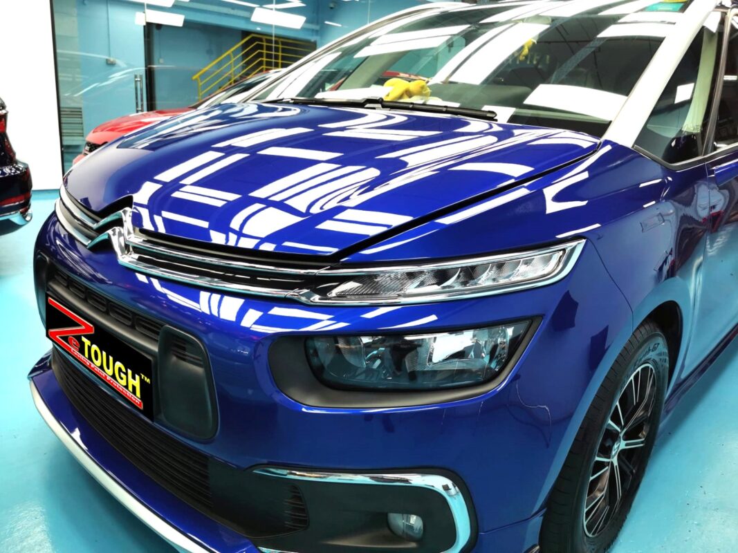 The Citroen Grand C4 Spacetourer's coated paintwork under workshop lighting.