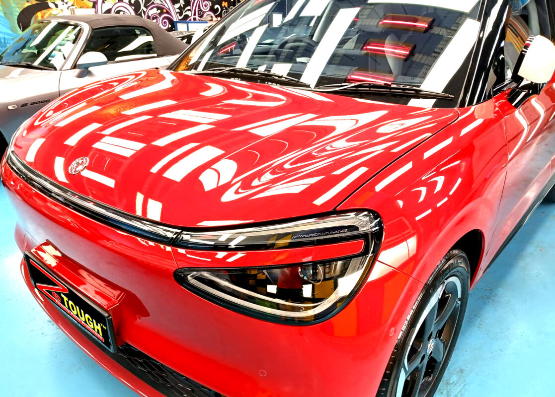 The Dongfeng Box's coated paintwork under workshop lighting.