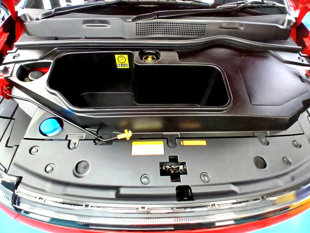 Reflections across the coated panels of the Dongfeng Box.