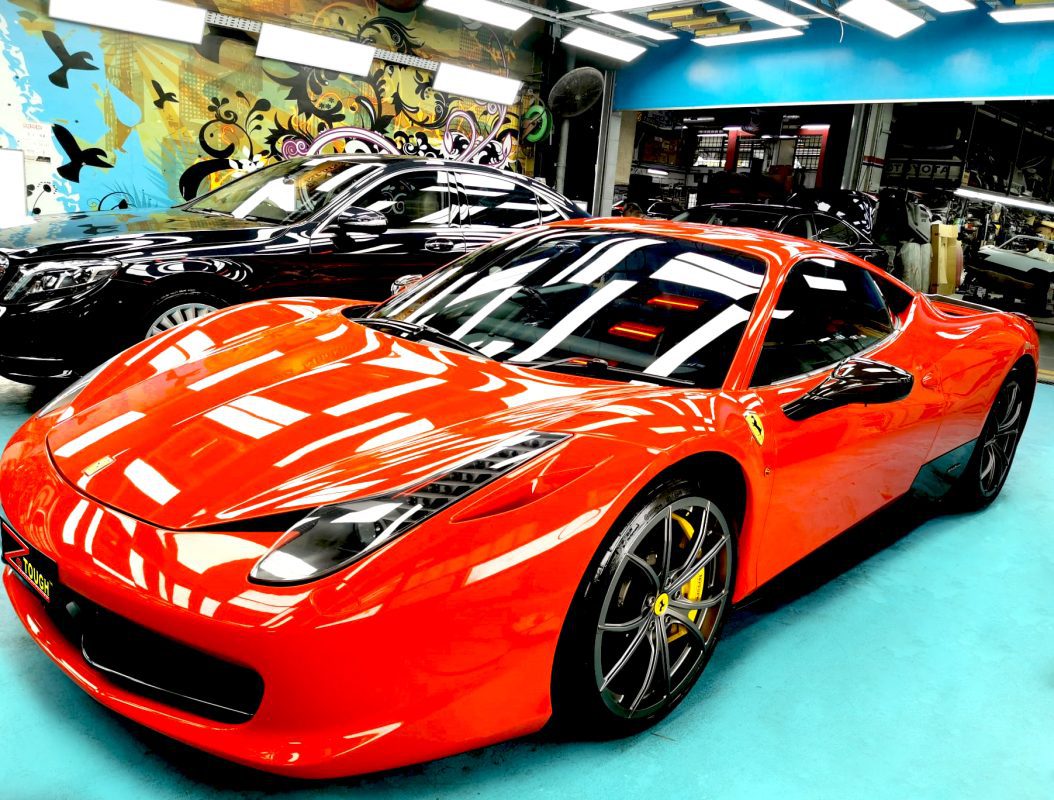 Red Ferrari 458, sealed with ZeTough Ceramic at Revol Carz.