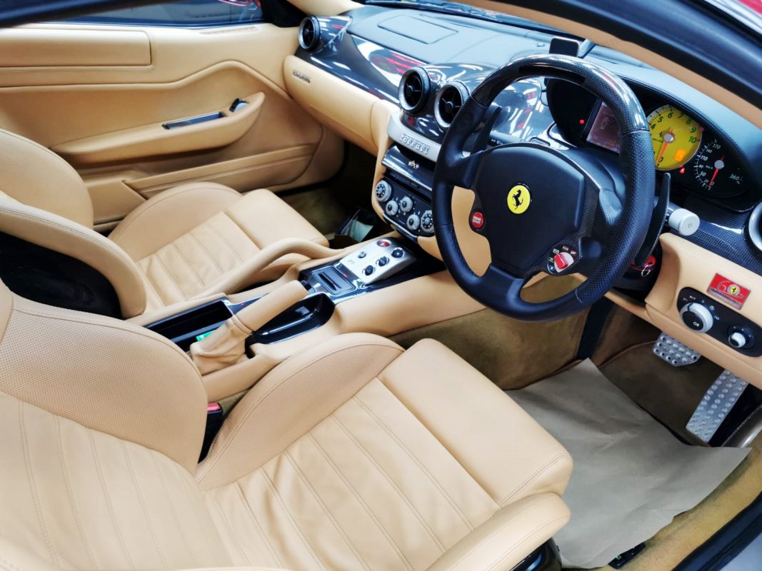 The Ferrari 599 parked in the workshop, freshly coated.