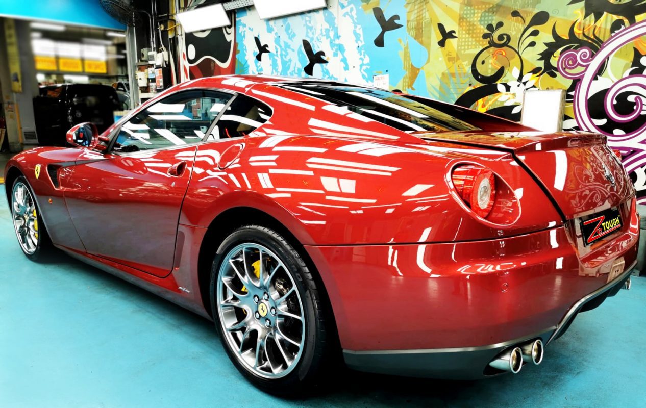 Rear quarter of the Ferrari 599, glossy and protected.