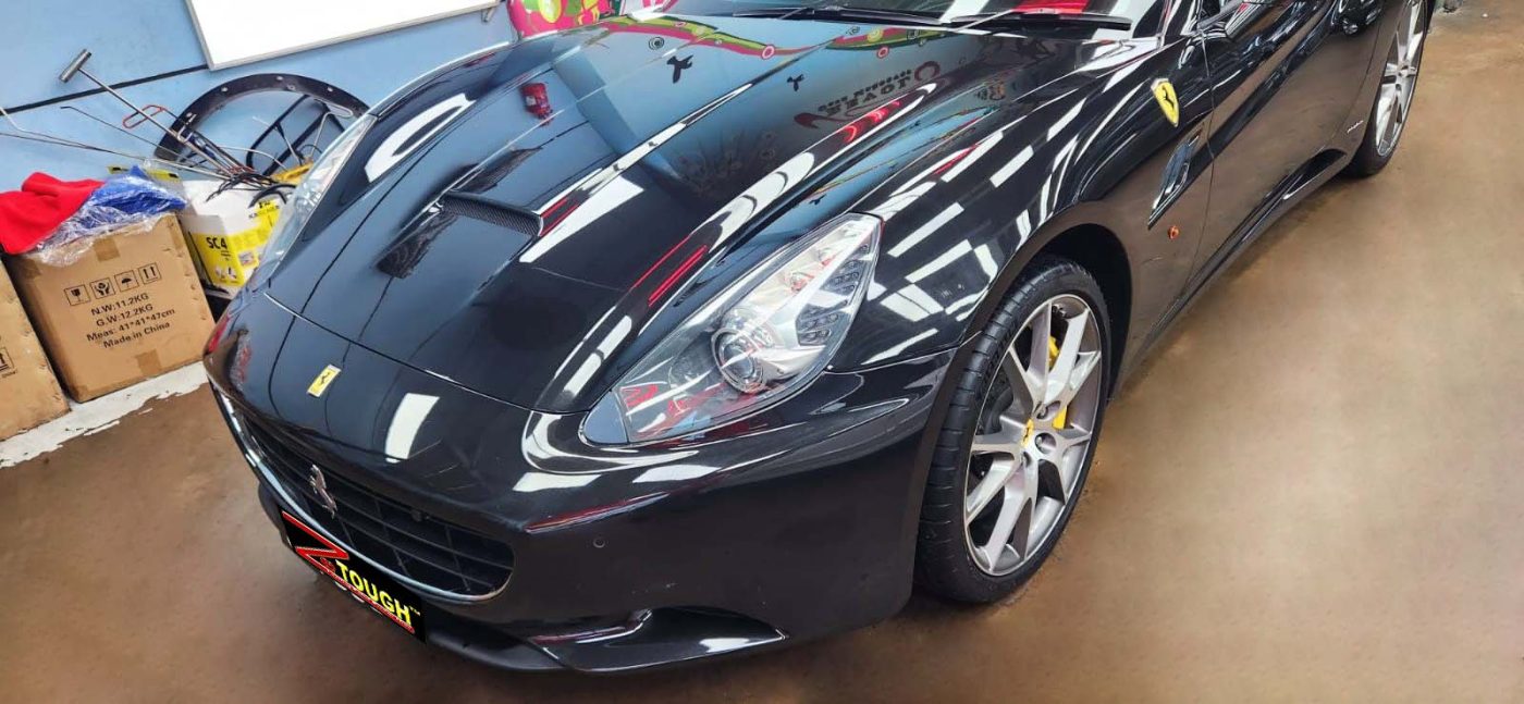 The Ferrari California from a side angle after the ceramic coating.