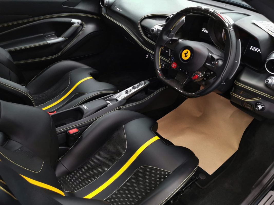 The Ferrari F8 parked in the workshop, freshly coated.