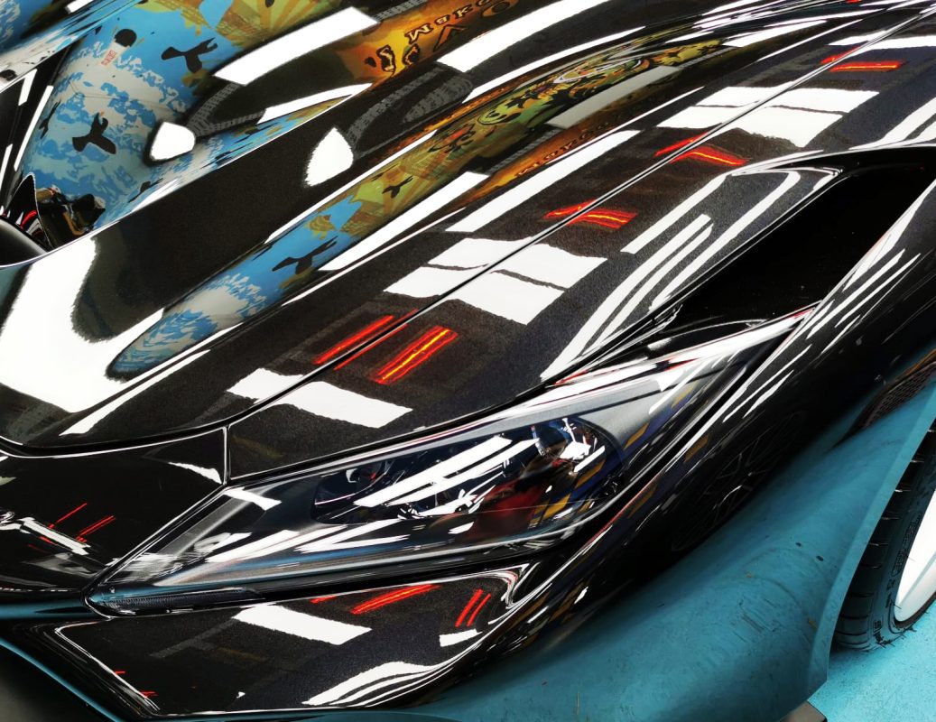 The F8 Tributo's coated bonnet holding clean reflections.