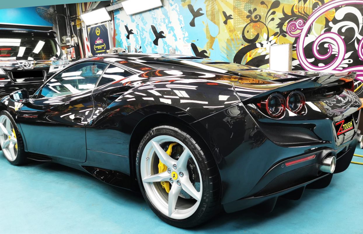 The F8 Tributo parked in the workshop, freshly coated.