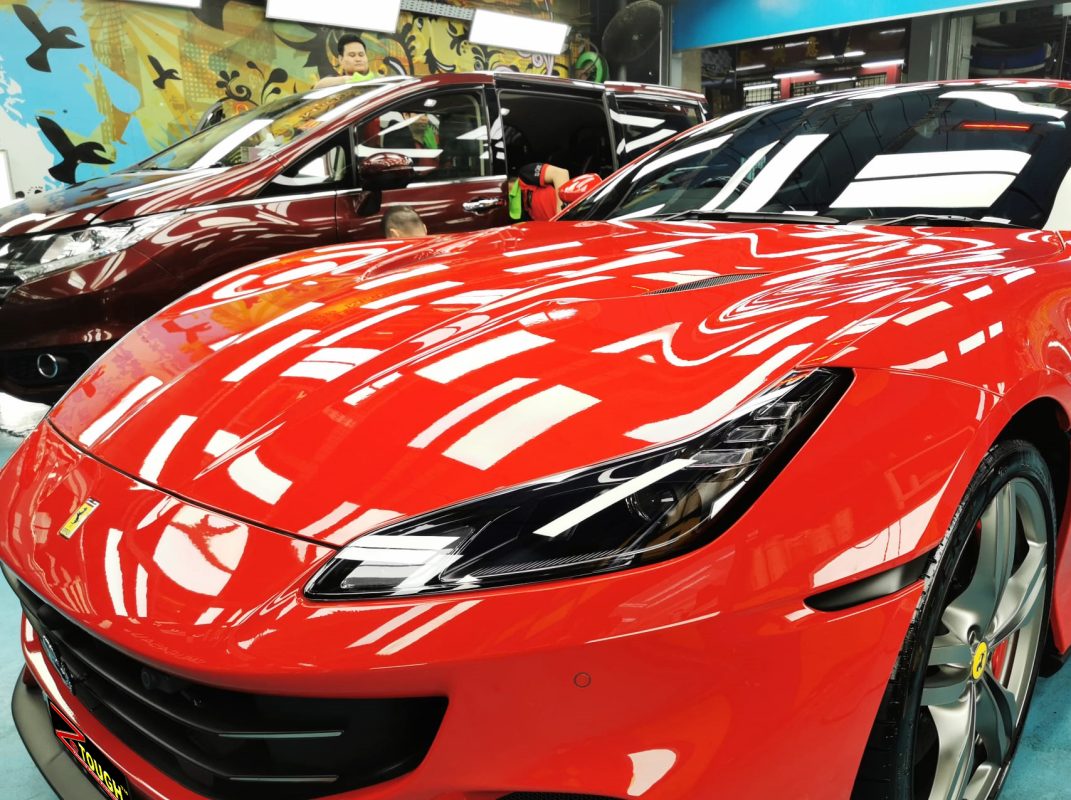 The Ferrari Portofino from a side angle after the ceramic coating.
