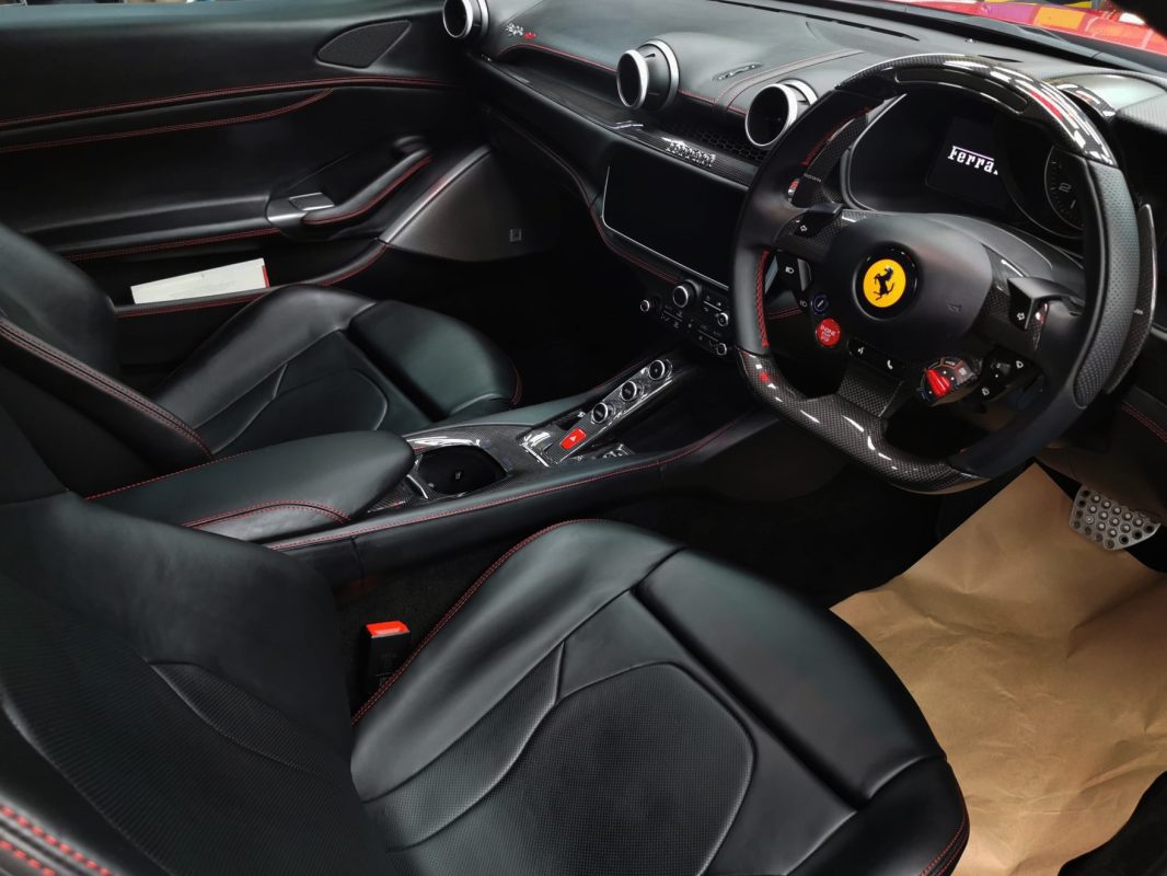 The Ferrari Portofino parked in the workshop, freshly coated.