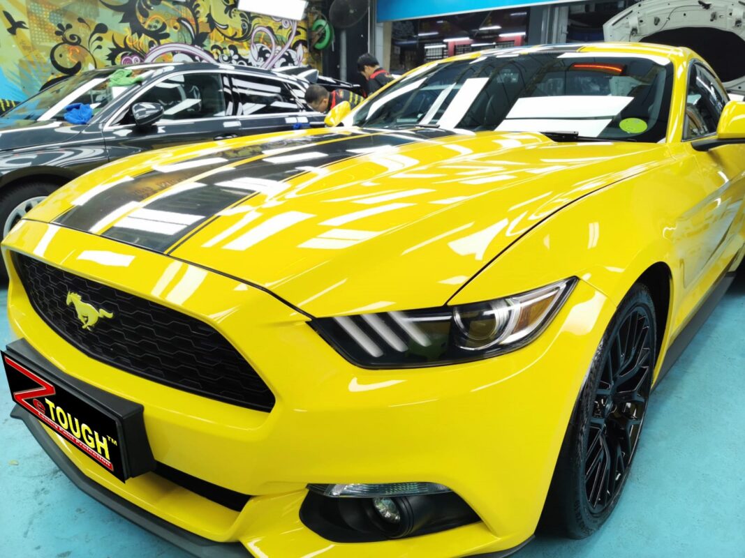 The Ford Mustang from a side angle after the ceramic coating.