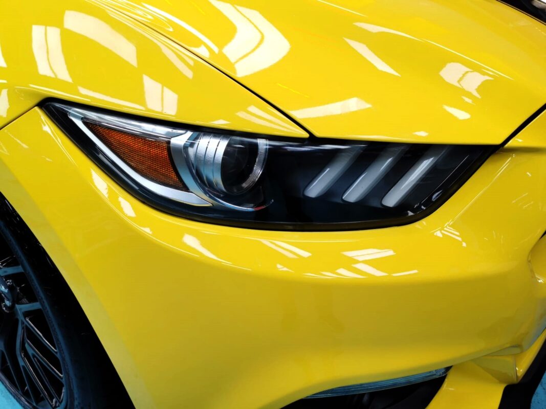The Mustang's coated paintwork showing clean reflections.