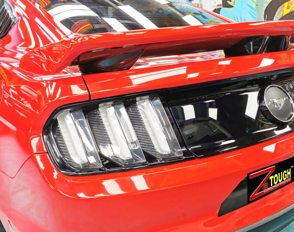 Detail of the wheel arch and panel edge on the Mustang.