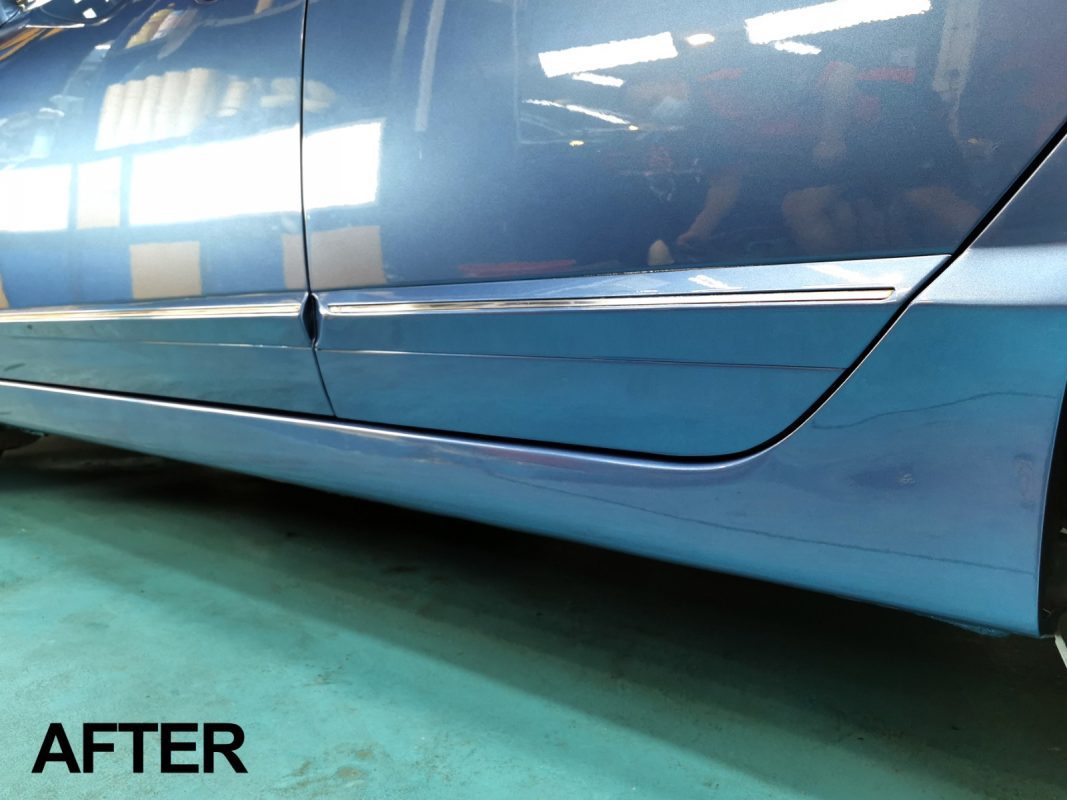 Glossy body panels on the Civic after the ceramic coating.