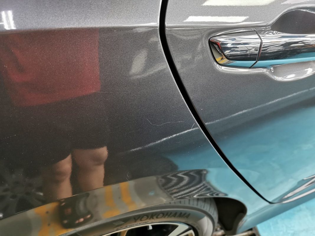 The Honda Civic's paintwork at intake before the respray.