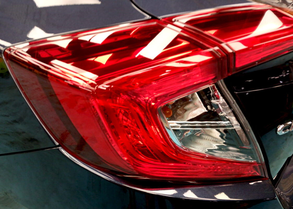Rear quarter of the Honda Civic, glossy and protected.