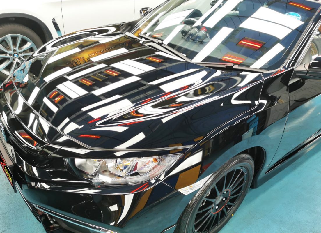 The Honda Civic from a side angle after the titanium coating.