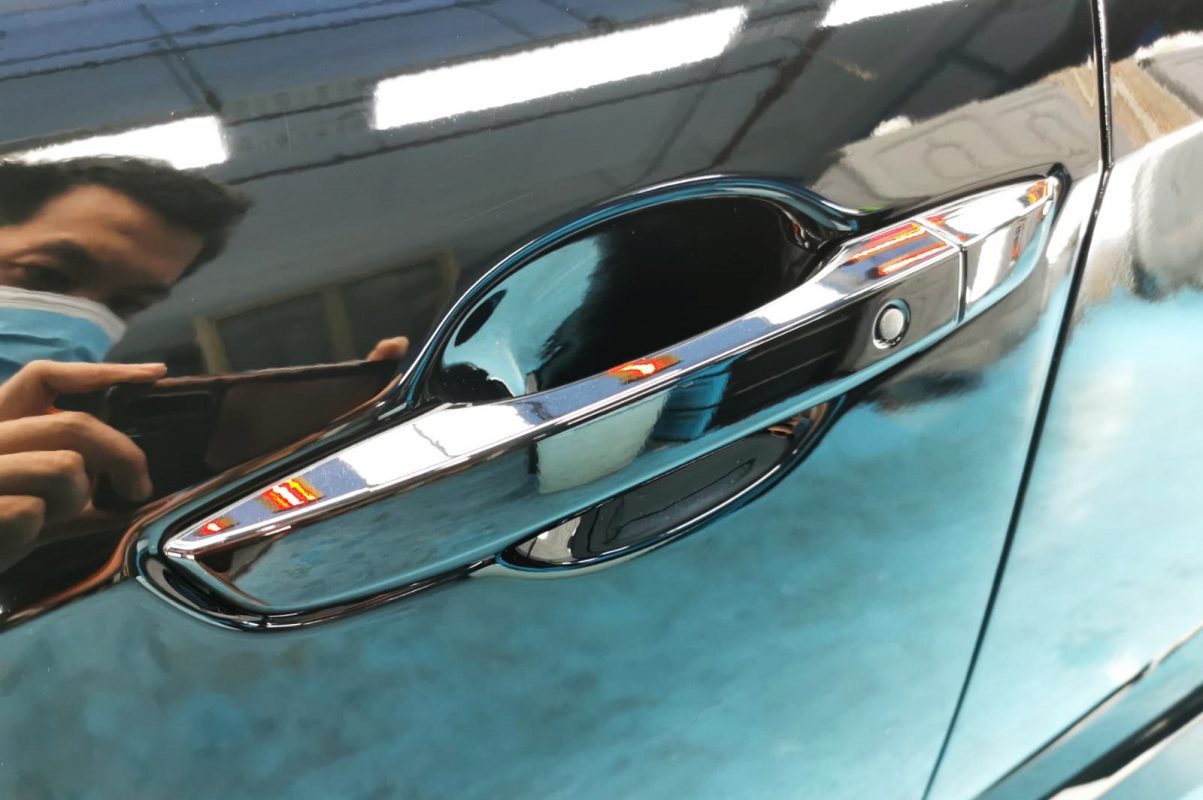 Rear quarter of the Honda Civic, glossy and protected.