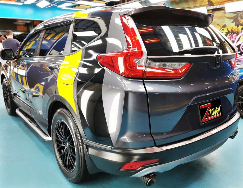 Rear quarter of the Honda CR-V, glossy and protected.