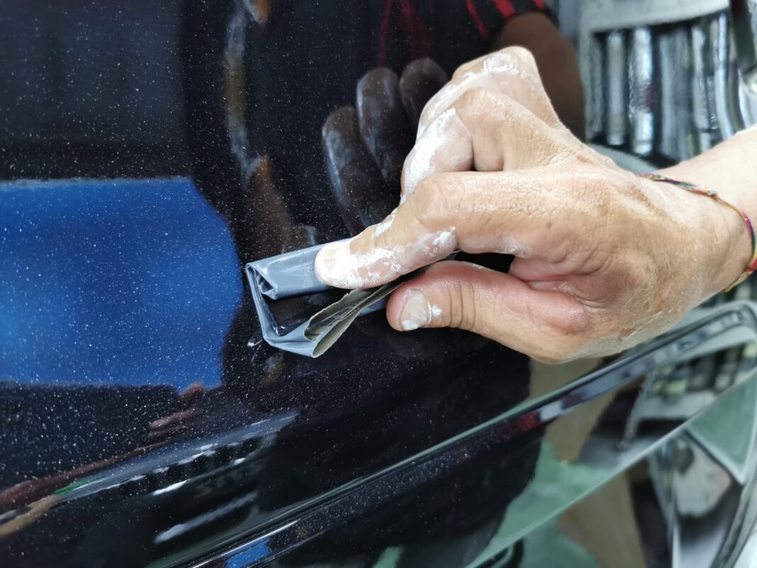 Honda CR-V in the spray booth receiving its new coat of paint.