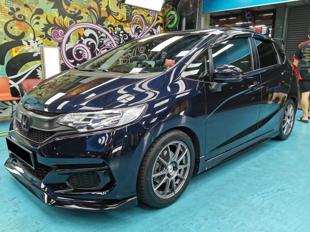 The Honda Fit as it arrived at Revol Carz before the respray.