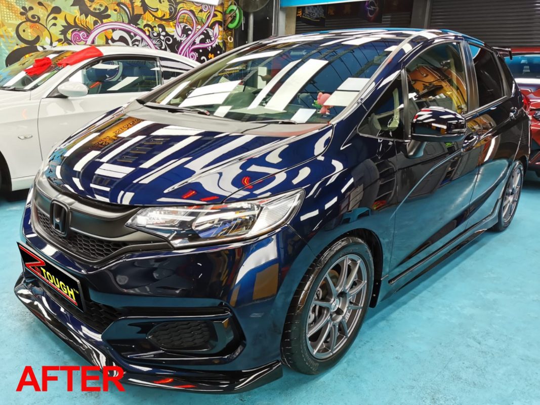 The Honda Fit after the full respray.