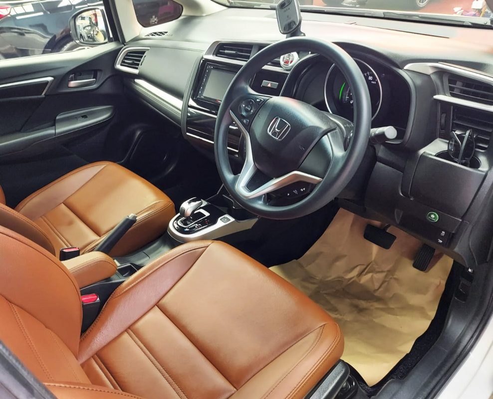 Front three-quarter view of the Honda Fit Hybrid after coating.