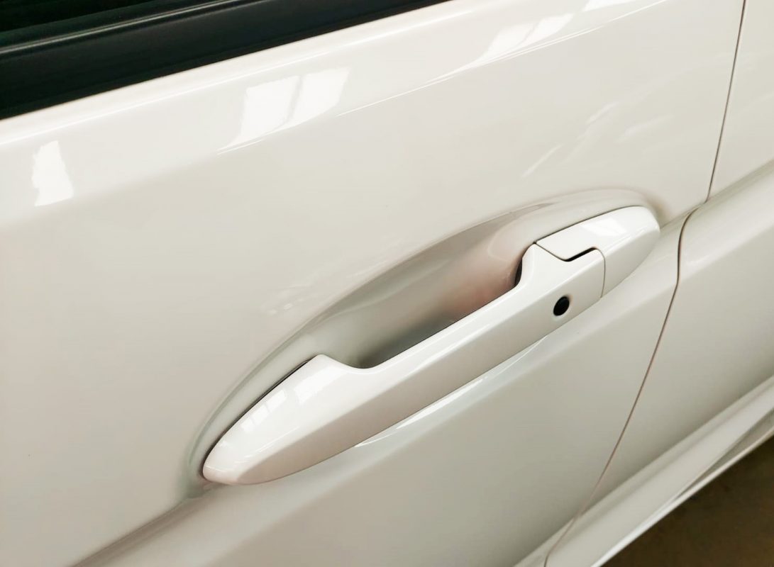 Rear view of the Honda Fit Hybrid, glossy and protected.
