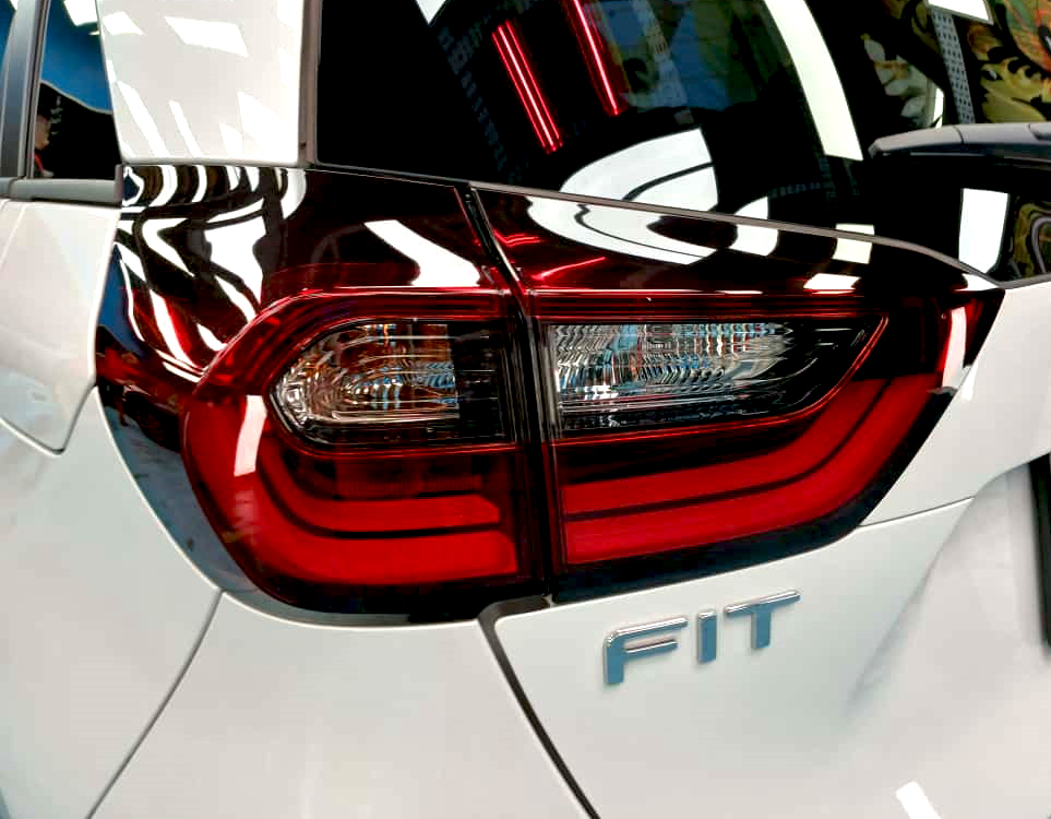 The Honda Fit parked in the workshop, freshly coated.