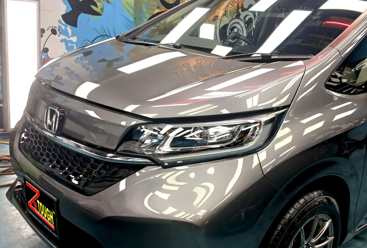 The Honda Freed from a side angle after the ceramic coating.