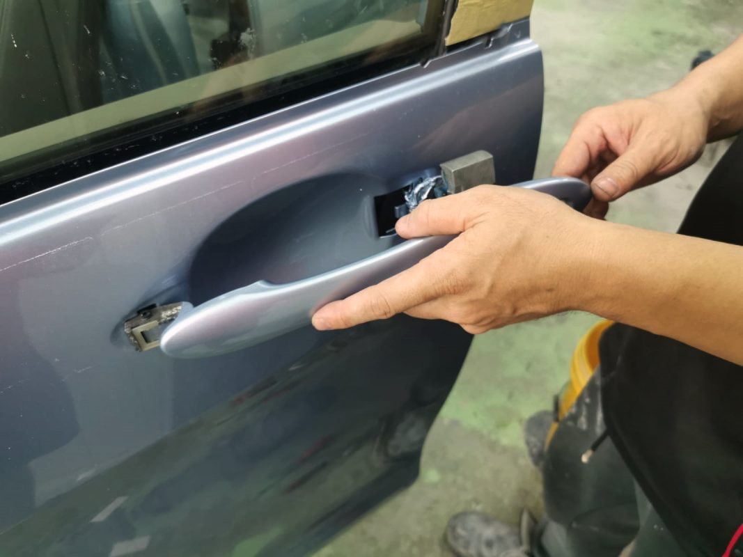 Buffing the new paint on the Freed to bring up the shine.