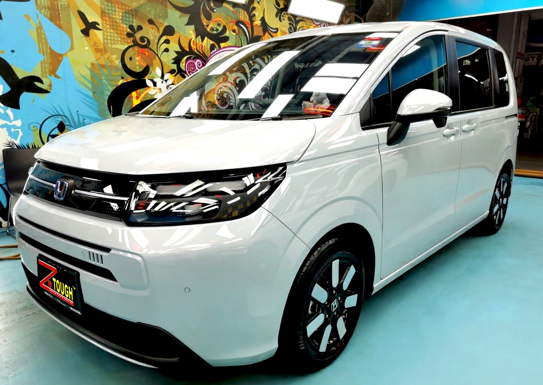 Honda Freed, glossy after its ZeTough Ceramic coating.