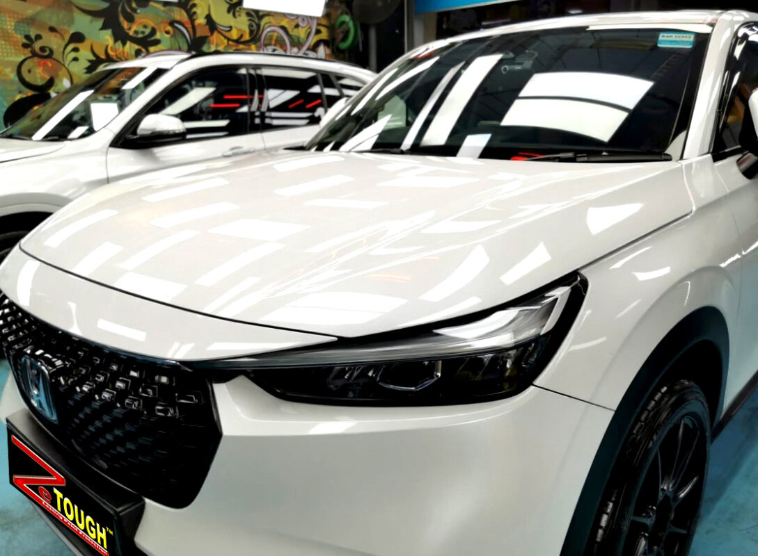 The Honda HR-V's coated paintwork under workshop lighting.