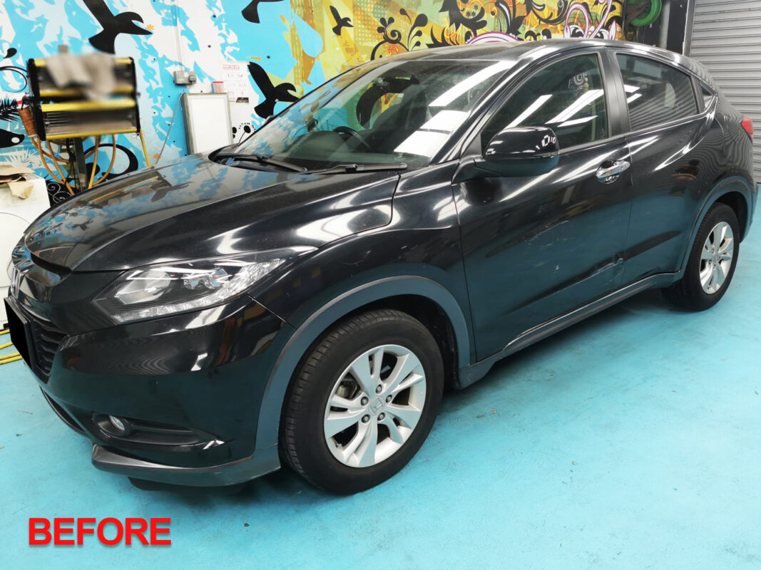 Honda HR-V freshly resprayed, front three-quarter view showing clean gloss finish.