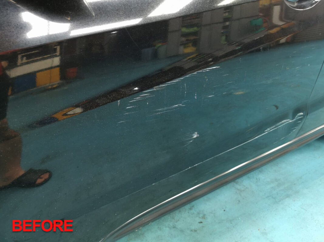 Honda HR-V reassembled in the workshop, parts being refitted.