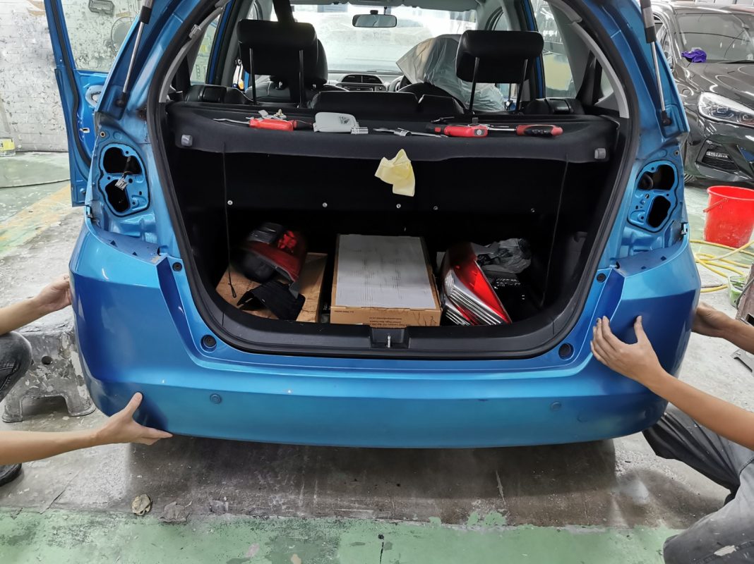 Body panels on the Honda Jazz exposed after full strip-down.