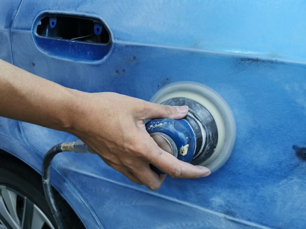Surface preparation on the Honda Jazz: patching and filler work.