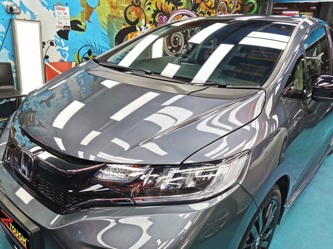 The Honda Jazz from a side angle after the titanium coating.