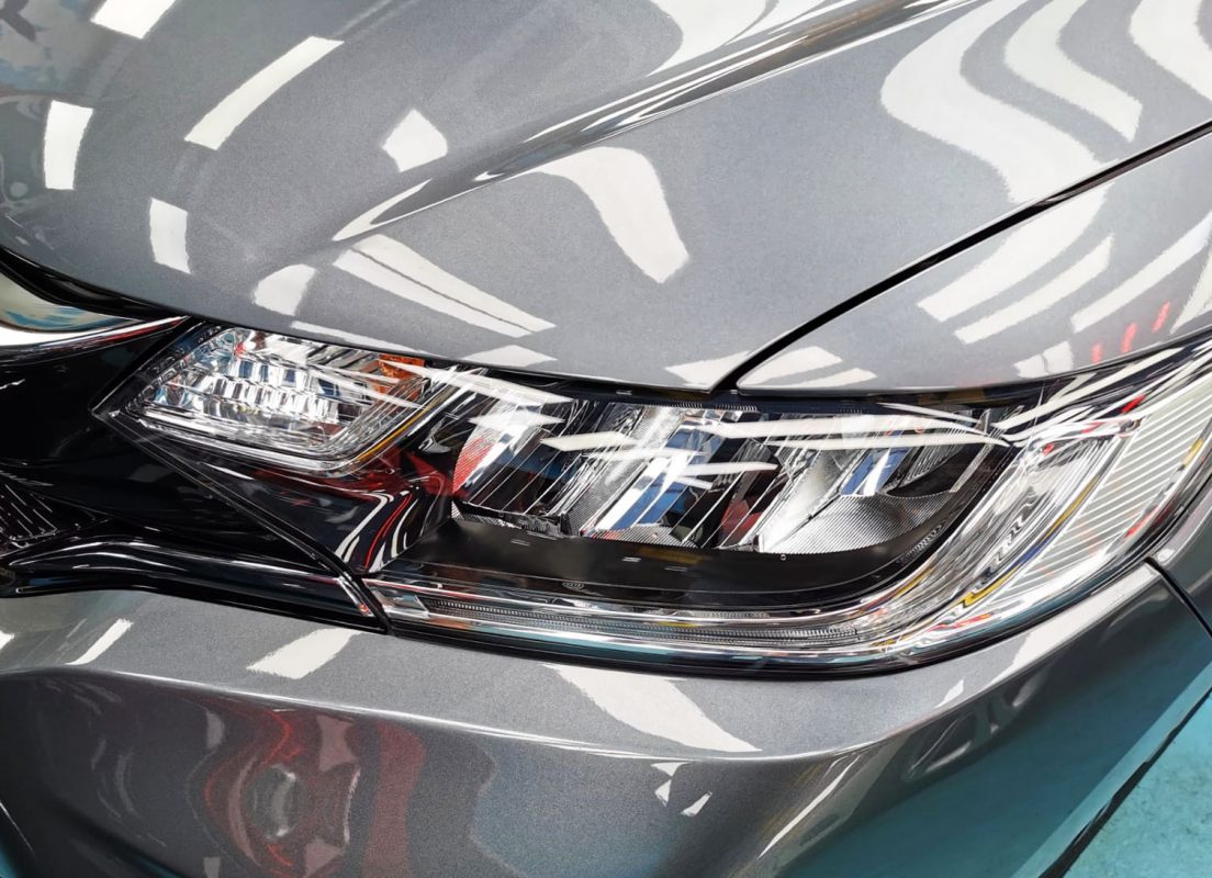 The Jazz's coated paintwork showing clean reflections.