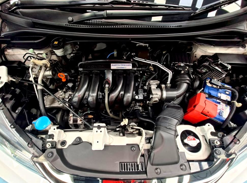 View of the engine bay with the bonnet open.